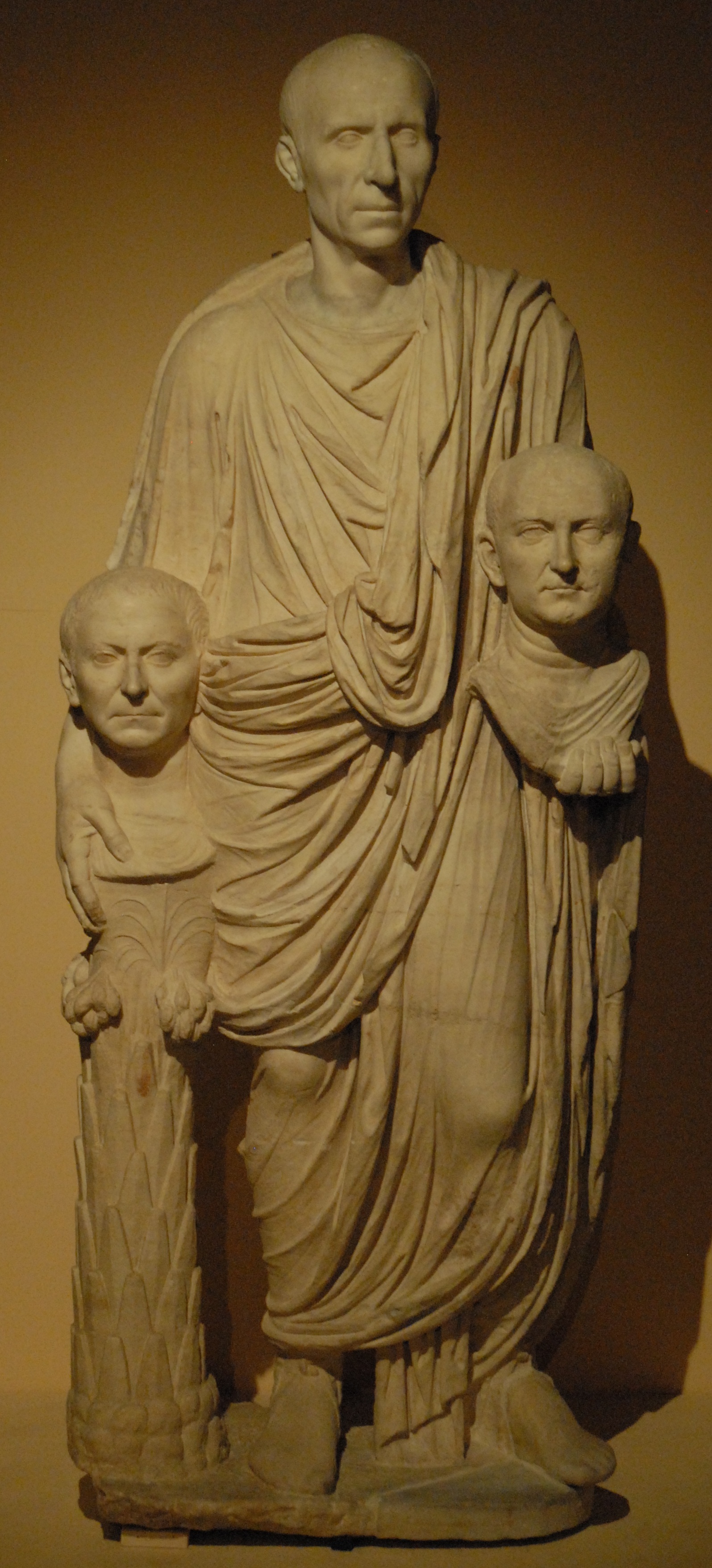 marble statue of senator with ancestor-busts, last decade 1c BC
